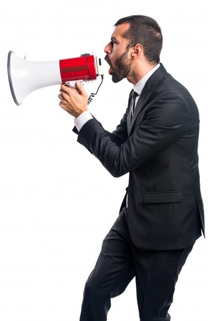 Businessman shouting on a megaphone